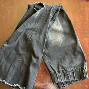 Bellbottoms pants with distress knees. Size Large long